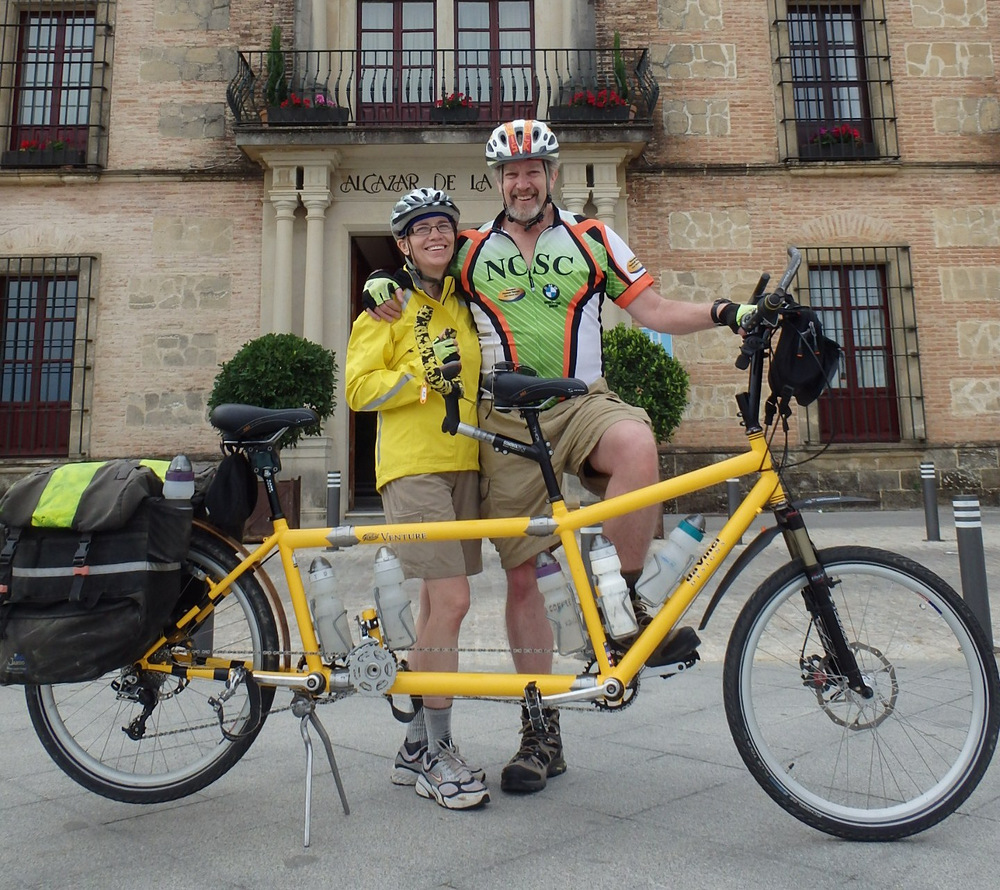 Dennis and Terry Struck pose with the Bee (a da Vinci Tandem) in front of the 'Alcazar de la Reina', Carmona, Andalucia, Spain; 4 May, 2015.